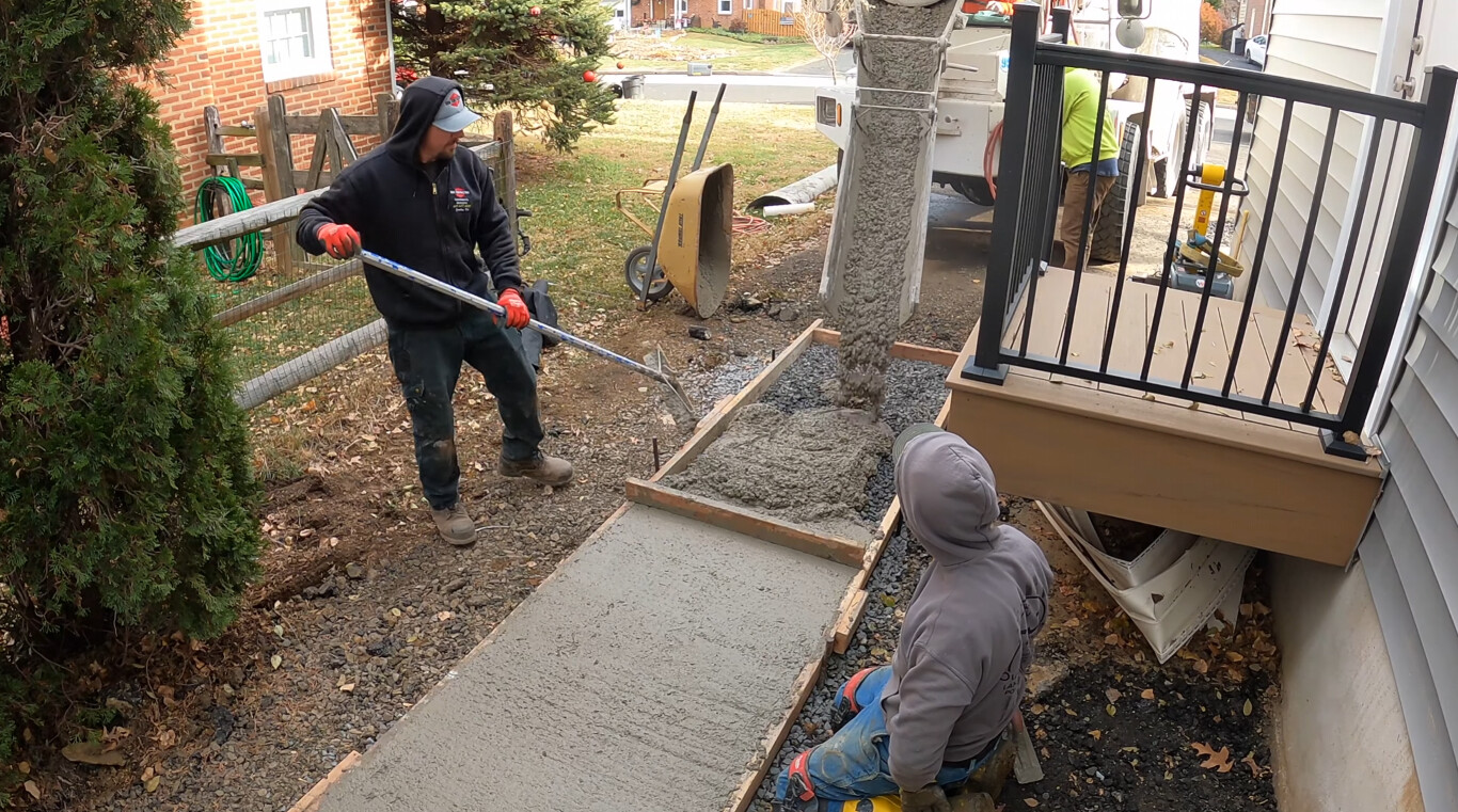 Concrete walkway installation showing proper preparation in Perth Amboy